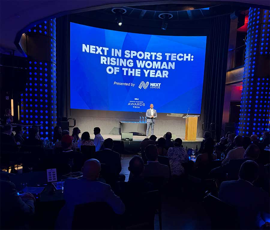 Former NFL star Andrew Hawkins in action hosting the SBJ Tech-Awards