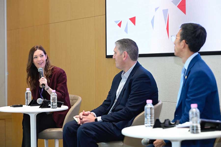 ASTN COO Amy Crosland moderating a panel discussion at the Smart Cities